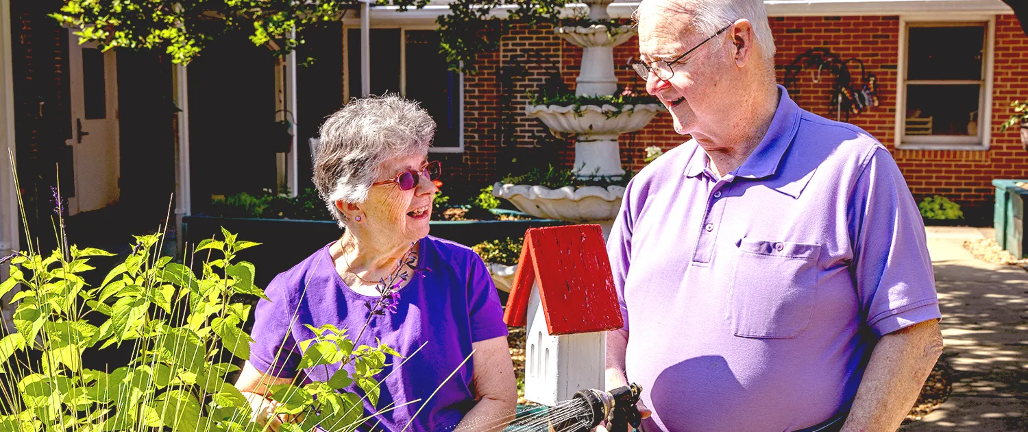 Neighbors visiting together in a Village courtyard
