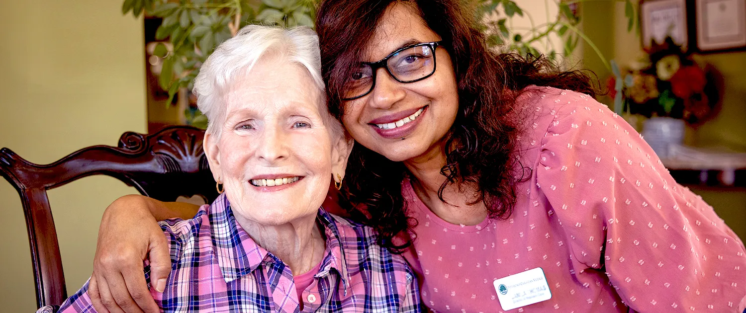 A resident smiling outside at Pittsboro Christian Village
