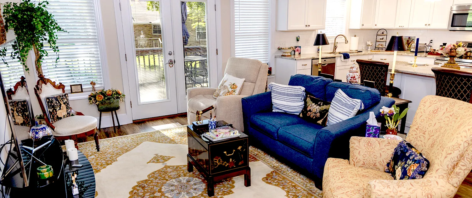 A bright sitting room inside a Village home